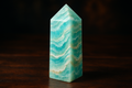 A beautiful Caribbean calcite crystal tower with swirling patterns of turquoise blue, seafoam green, and white reminiscent of Caribbean waters
