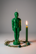 Green Male Figure Candle Hero