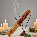 HEM Good Luck incense lifestyle shot with burning sticks, smoke and lucky props