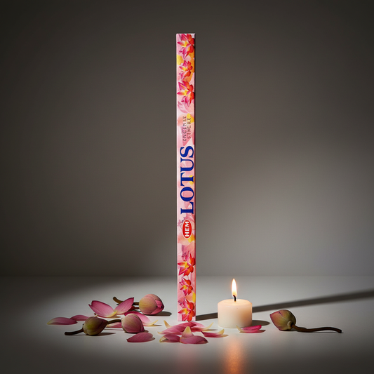 HEM Lotus incense hero shot - long box upright with lotus petals and candlelight