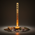 HEM Sandal incense hex box standing upright with HEM at top, sandalwood chips, crystals and candlelight