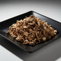 Dried dandelion root on black ceramic plate hero shot