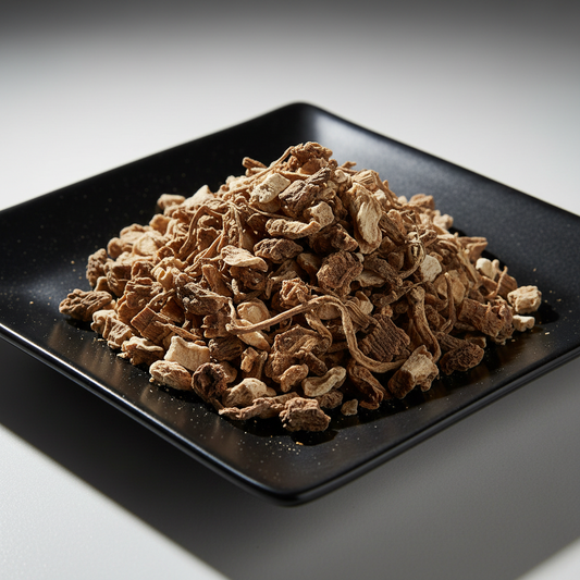 Dried dandelion root on black ceramic plate hero shot