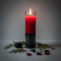 7 day reversal candle with red and black two-color wax in glass jar with black tourmaline, herbs and rose petals on light grey background