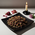Red Clover Blossoms on black ceramic plate hero shot