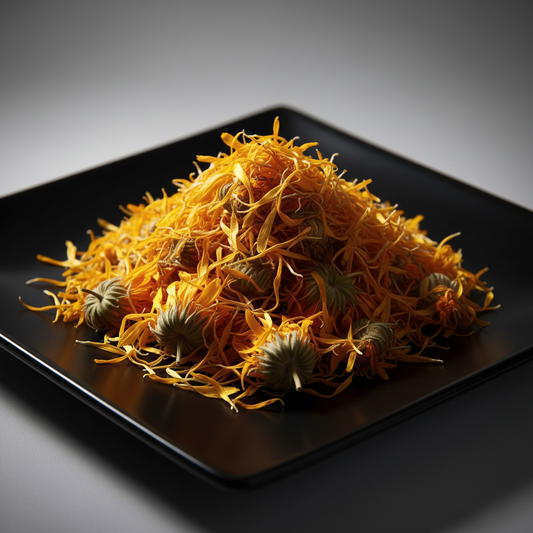 Dried calendula flowers and petals on black ceramic plate hero shot