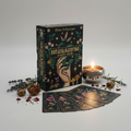 Herbarium Oracle Cards box by Elisa Seitzinger on bright white background with oracle cards and dried botanicals